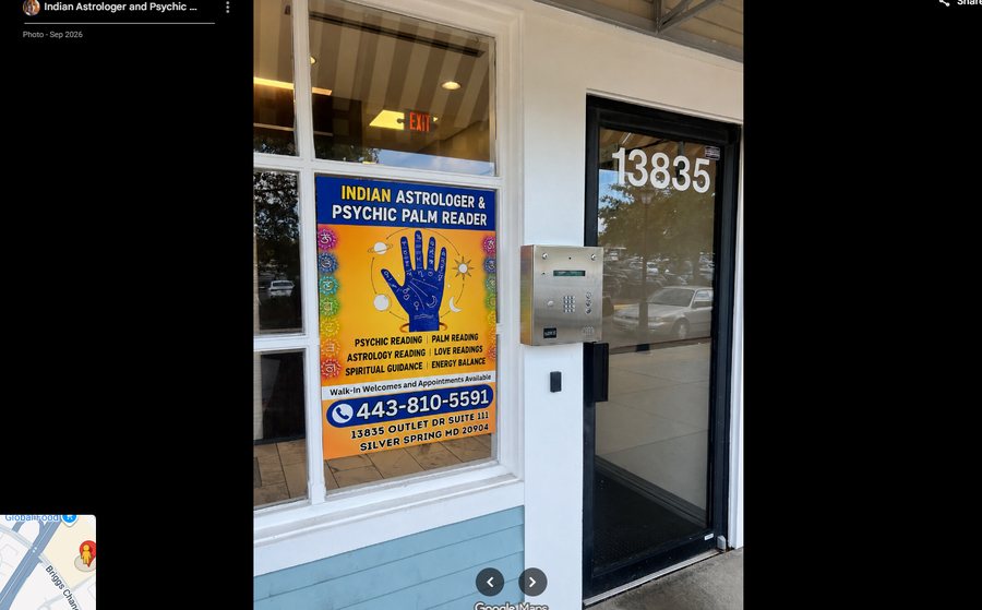 Storefront window sign for Indian Astrologer and Psychic Palm Reader